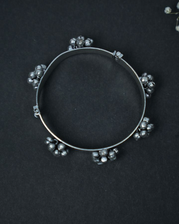 Flower motif oxidized silver bracelet